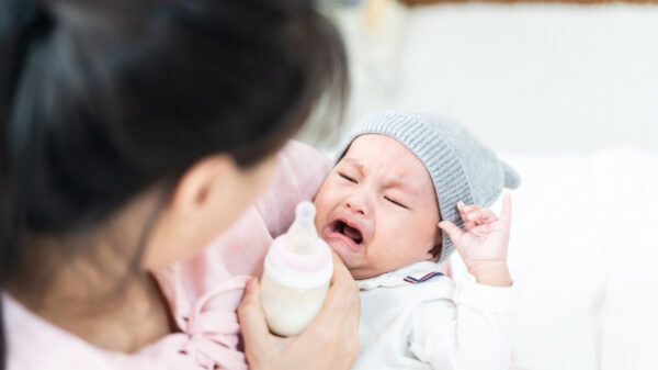 Soothe a Baby Crying While Bottle Feeding