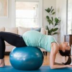 Pregnancy stretches and tools, including resistance bands, yoga mats, and stability balls, for a comfortable and supportive wellness routine.